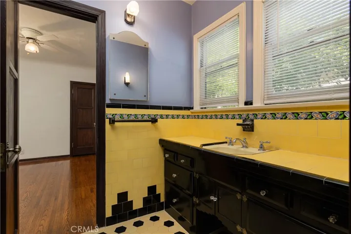 Full bathroom, all original tiles and cabinetry