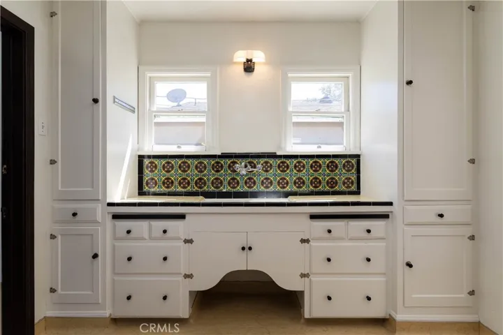 original kitchen cabinetry and tiles