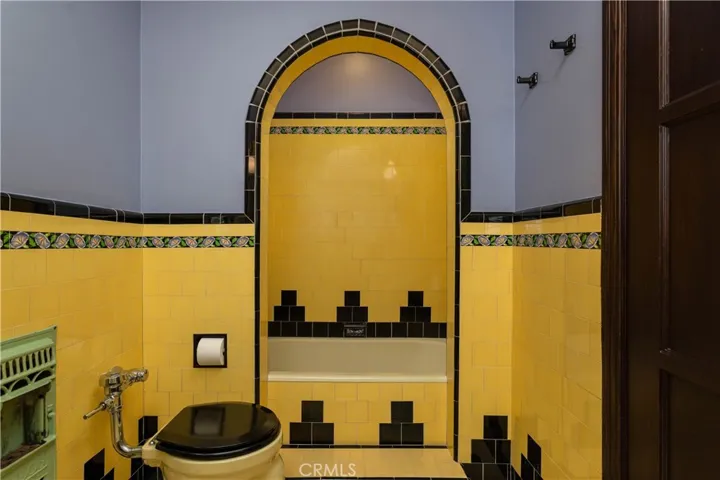 Full bathroom tub and shower, all original tiles