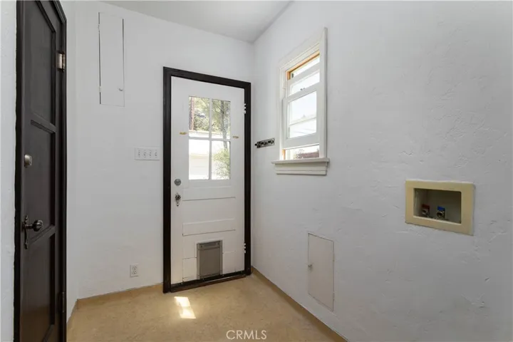 Laundry/mudroom, door to backyard and garage