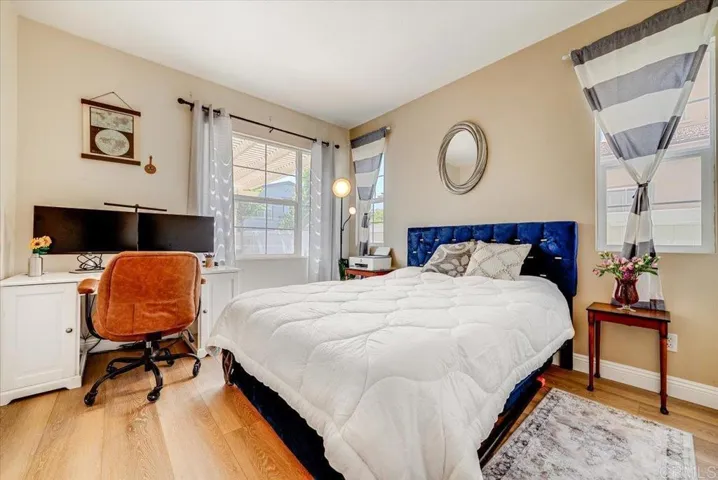 Bedroom on main level adjacent to a full bathroom.