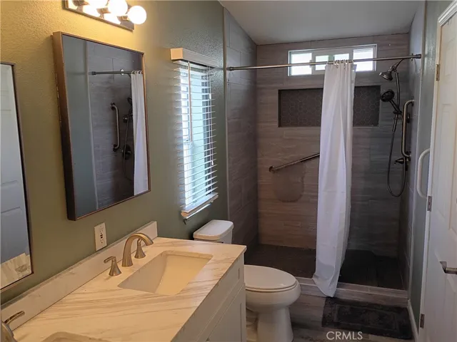 master bathroom with dual sinks