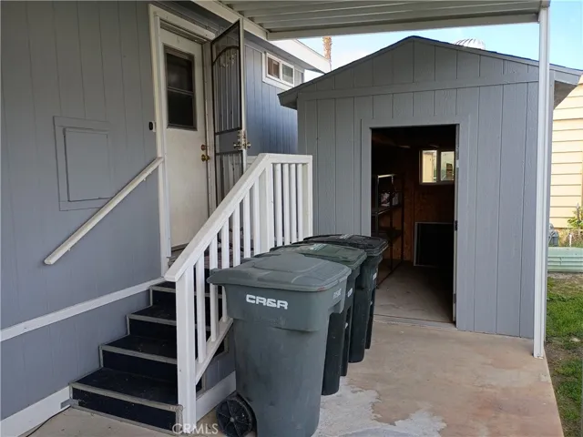 driveway entrance with storage work shop
