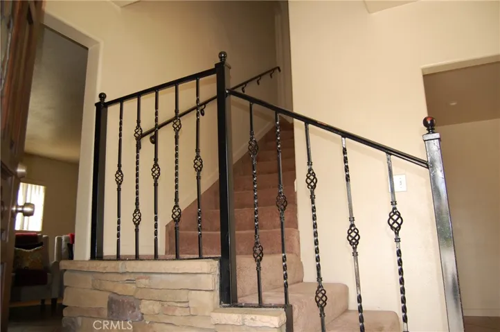 Elegance with Rock and wrought iron.