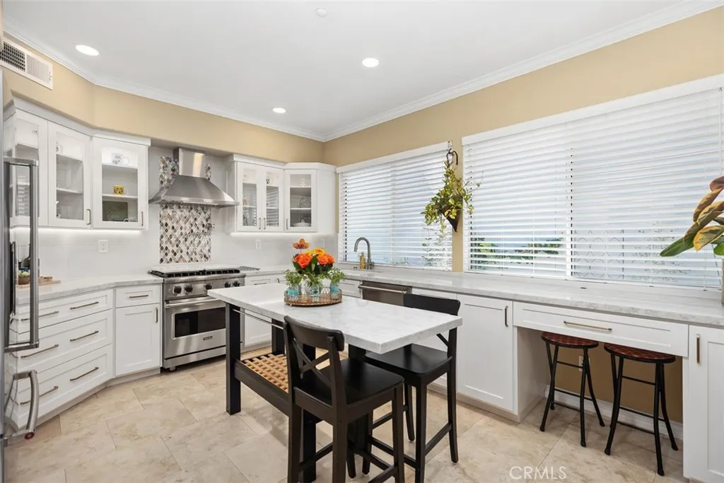 Custom kitchen with cabinetry.