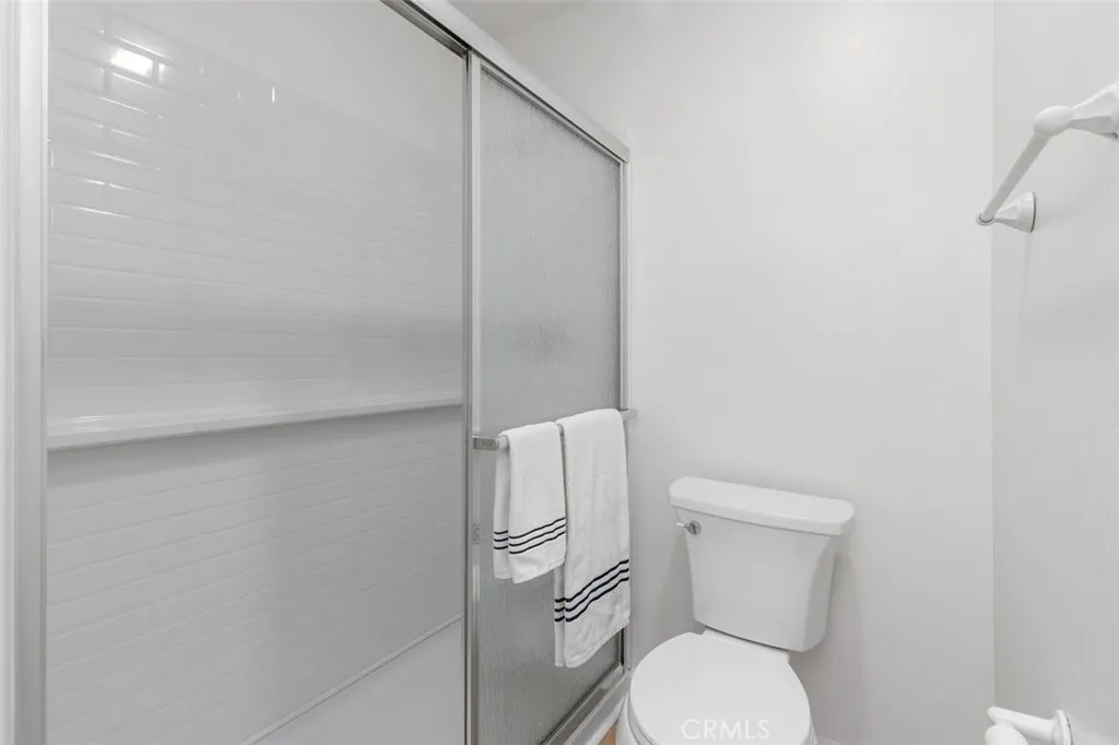 New step in shower with new glass sliding enclosure.