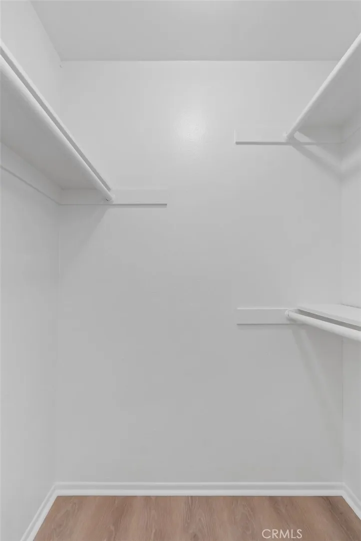 Walk in closet has plenty of room.