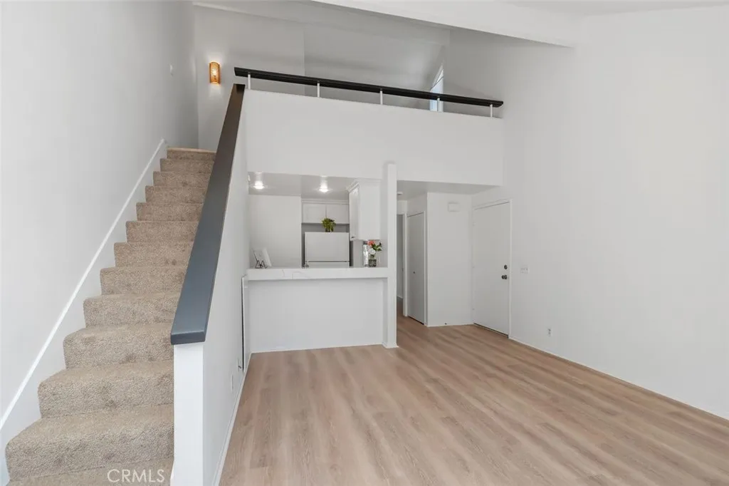 Open floor plan allowing abundant light and space. New flooring throughout, freshly painted throughout, new baseboards through out!