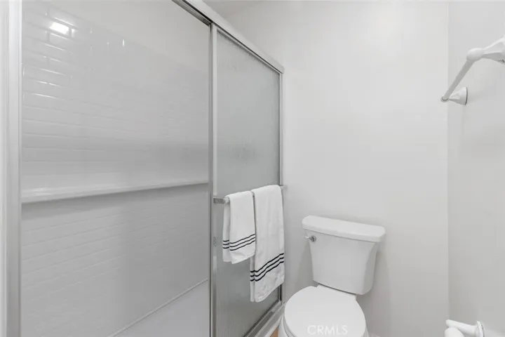 New step in shower with new glass sliding enclosure.