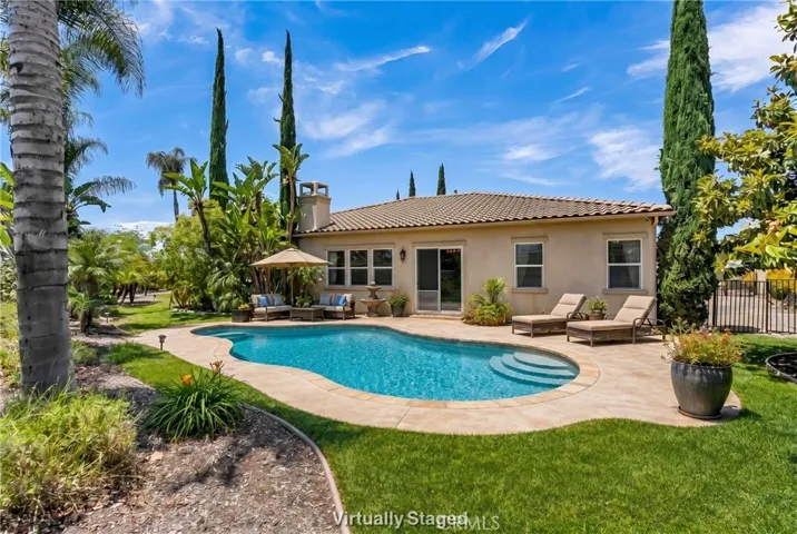 Photo is virtually enhanced to show  pool potential