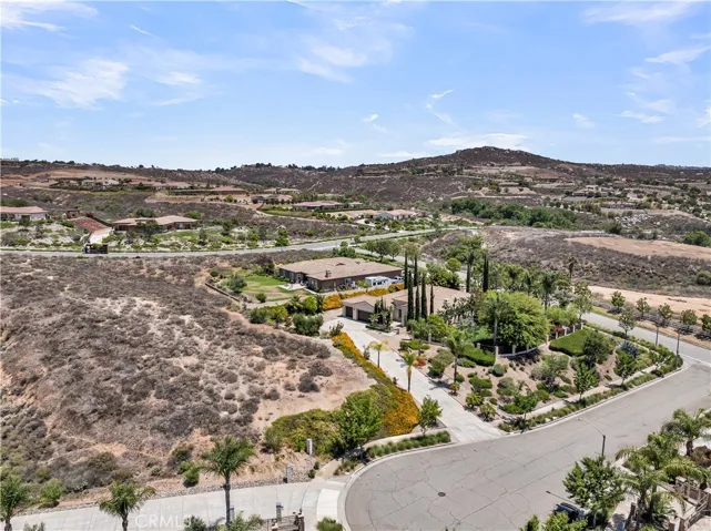 Lot Extends to the Other Side of the Driveway