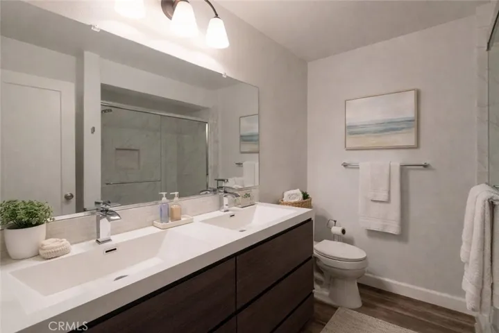 Primary Bathroom. Photo is virtually enhanced.