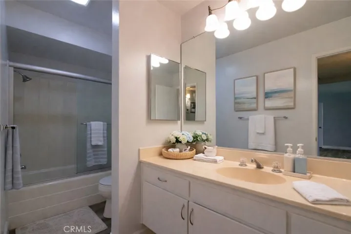 Guest Bathroom. Photo is virtually enhanced.