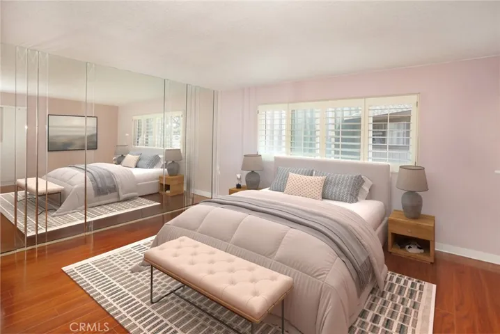 Master bedroom: Virtual staging shows the home’s potential with stylish, modern updates.