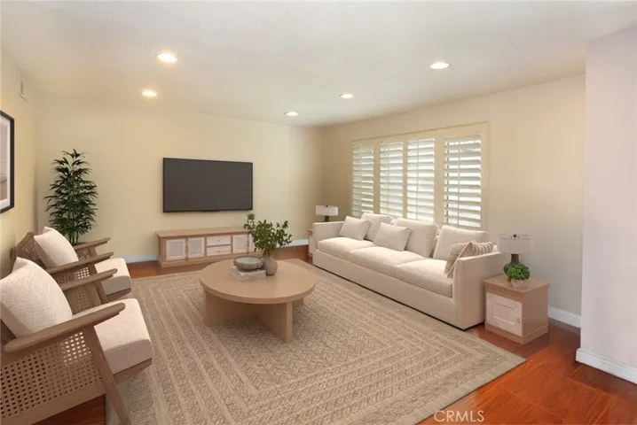 Living room: Virtual staging shows the home’s potential with stylish, modern updates.