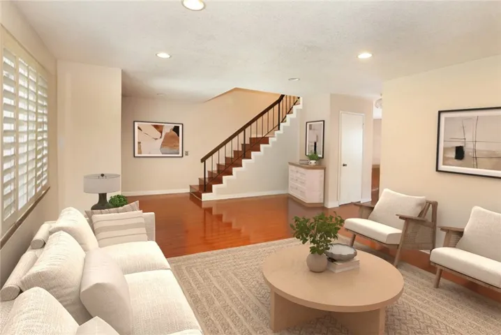Living room: Virtual staging shows the home’s potential with stylish, modern updates.