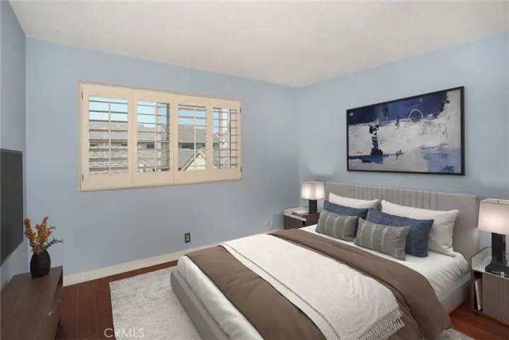 Upstairs 3rd bedroom: Virtual staging shows the home’s potential with stylish, modern updates.