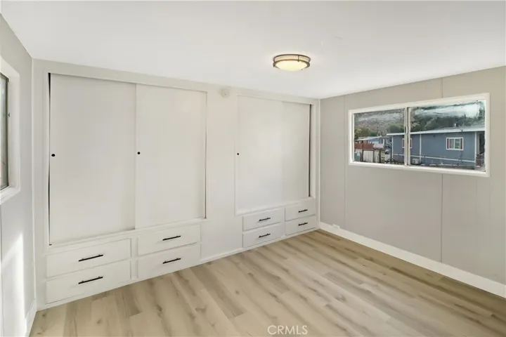 Bedroom 1 of 3, new flooring, bult-in closets