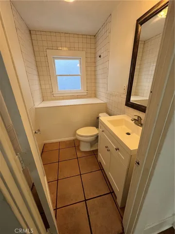 341 bathroom -functional/shower is under the wooden box