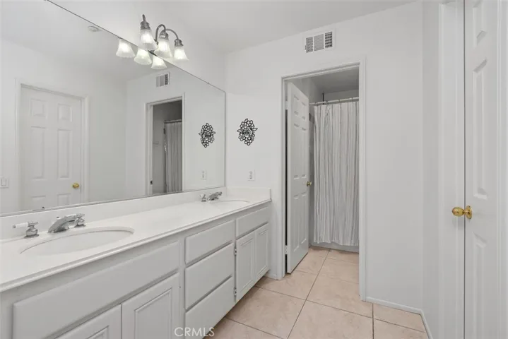 Primary bath with walk-in closet