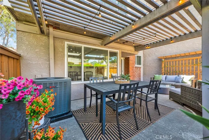 Patio has room for dining and lounging