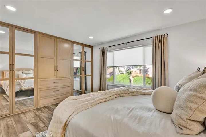 Custom closet organizers in primary bedroom