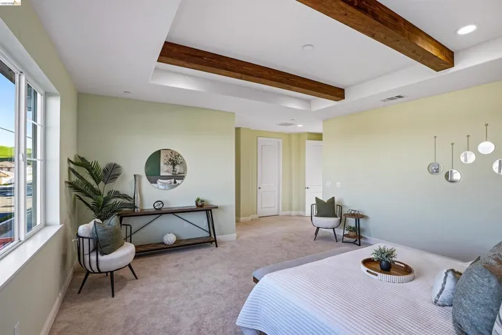 Carpeted bedroom featuring recessed lighting and beamed ceiling