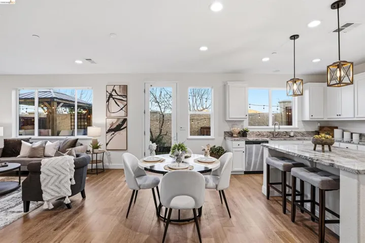 Dining space featuring light wood-type flooring and recessed lighting