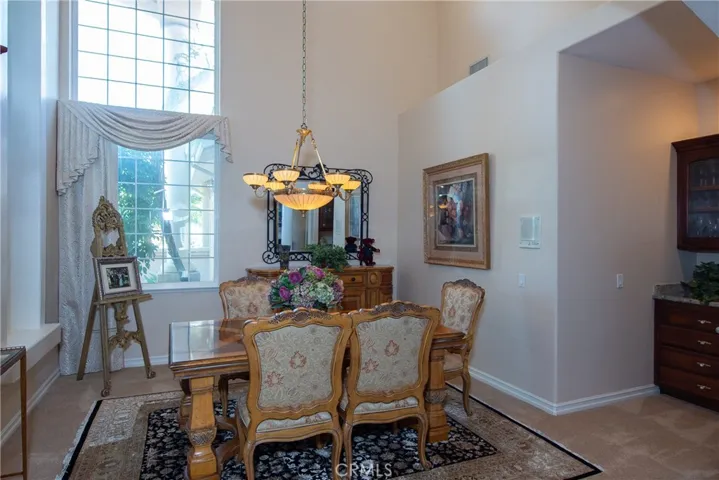 Formal dinning room with dry bar