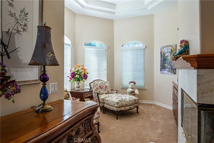 Primary sitting room with fireplace