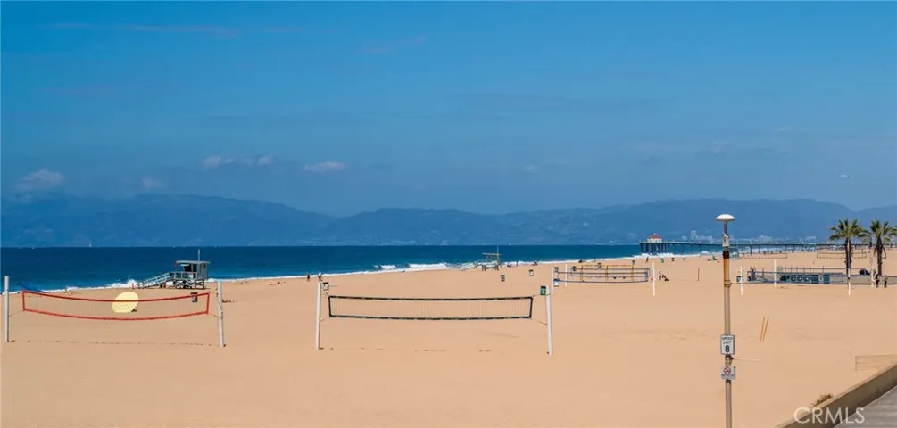 Wide open beachfront directly in front of the home with additional volleyball courts to the north. Enjoy expansive sand and unobstructed coastal views.