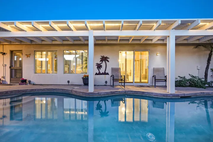 48431-panorama-pool facing LR twilight-0