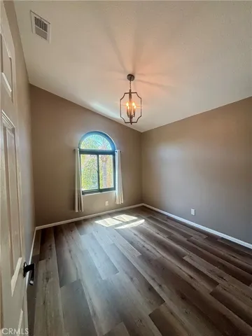 Bedroom #2: Large with custom light fixture and walk-in closet.