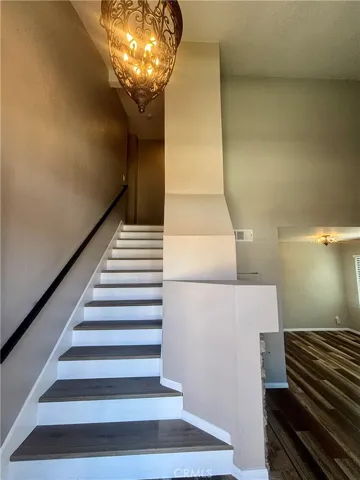 Completely remodeled. LVP plank wood look floors, custom chandelier.