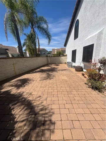Low maintenance backyard with interlocking pavers