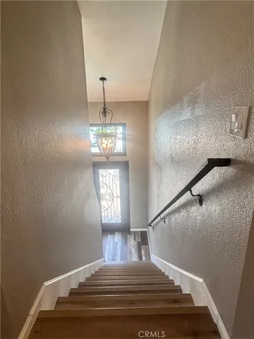 Stairs with custom iron rail