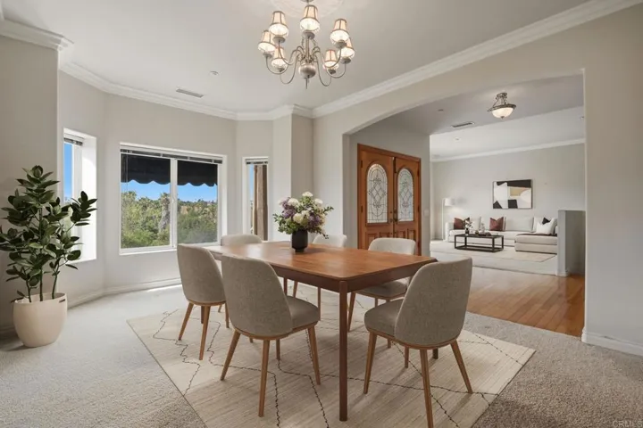 Virtually staged dining room and living room