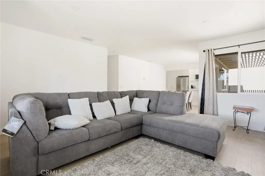 Open Concept Living Room Leading to the Kitchen