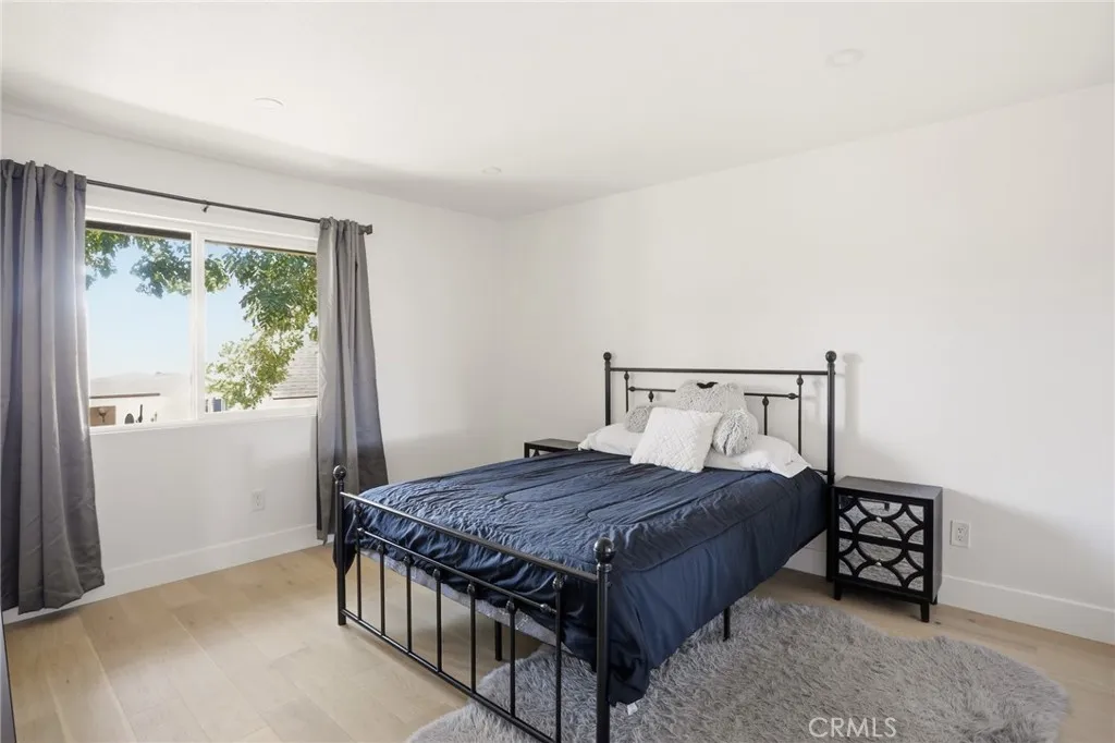 Bedroom #1 with Large Window Providing Plenty of Natural Light