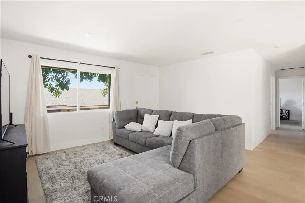 Large Window in Living Room with Beautiful LVP Flooring