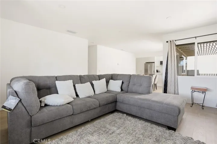 Open Concept Living Room Leading to the Kitchen