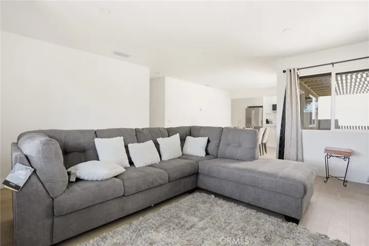 Open Concept Living Room Leading to the Kitchen