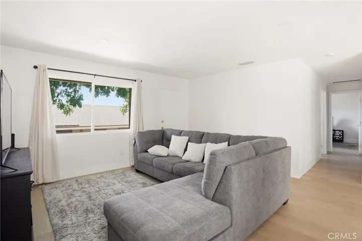 Large Window in Living Room with Beautiful LVP Flooring
