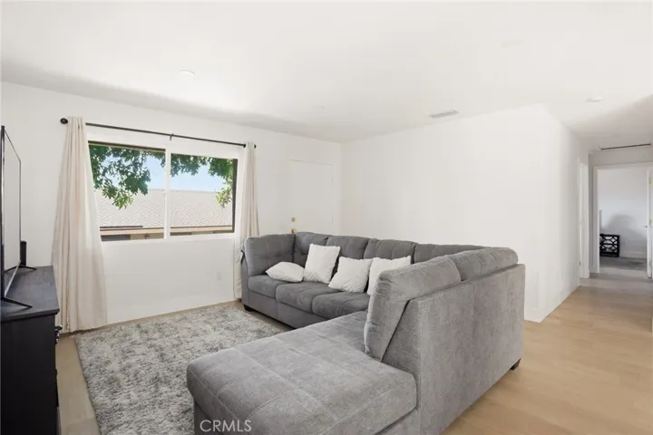 Large Window in Living Room with Beautiful LVP Flooring