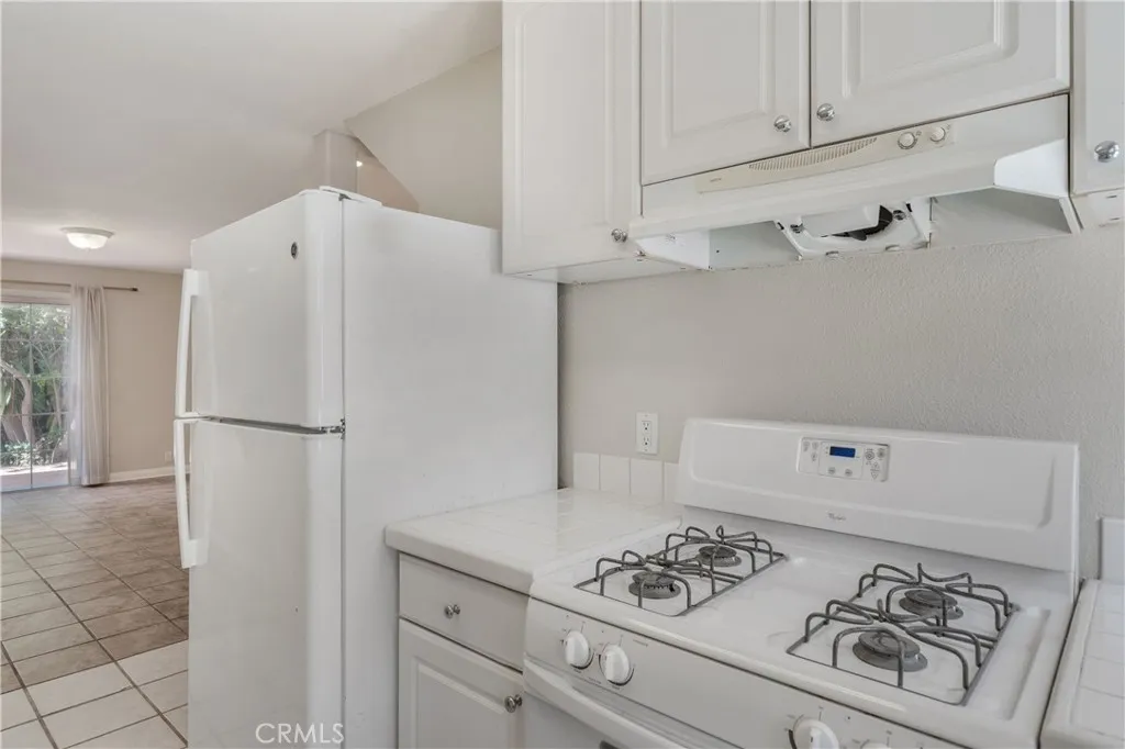 Sparkling white kitchen downstairs