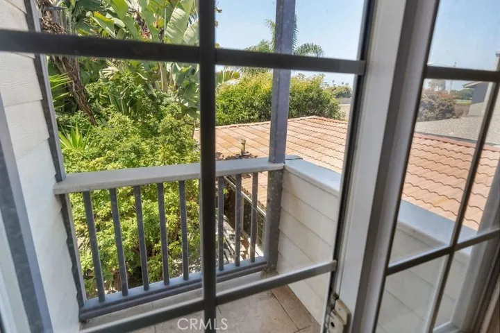 Balcony from upstairs unit.  Peek a Boo view of the ocean.