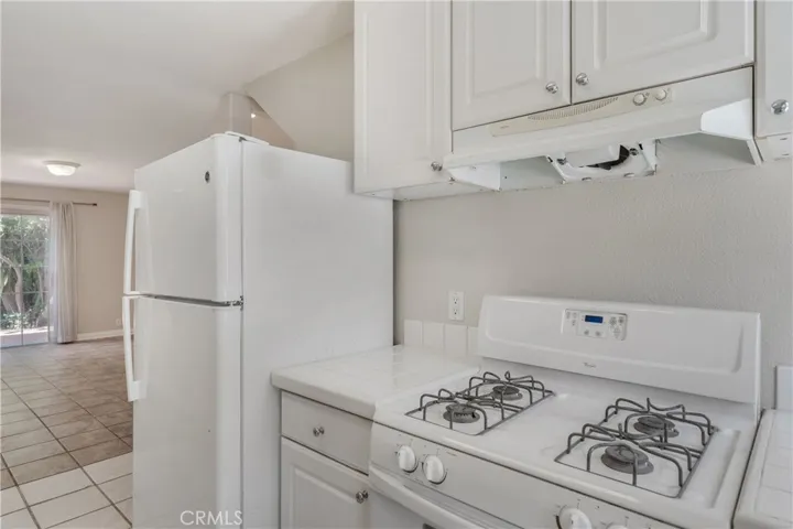 Sparkling white kitchen downstairs