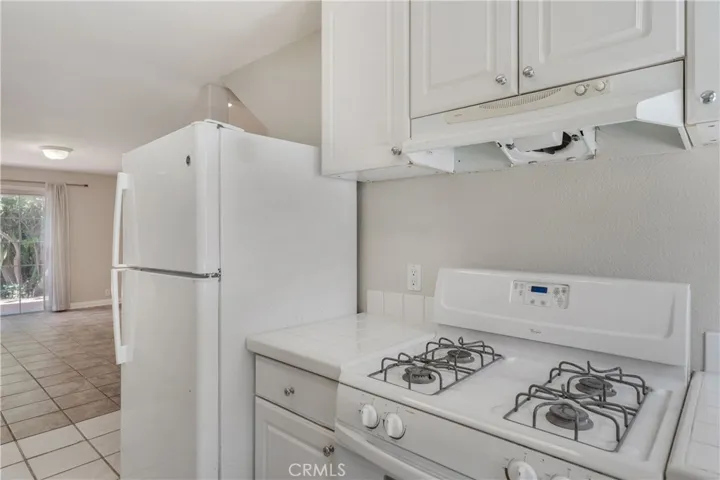Sparkling white kitchen downstairs