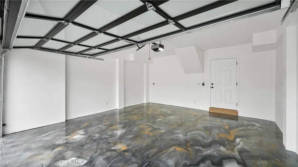 Epoxy-finished garage adds style, function, and easy maintenance
