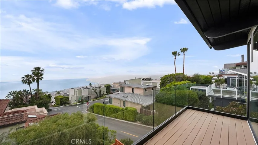 Indoor-outdoor coastal living at its best with ocean views from the main living area and balcony